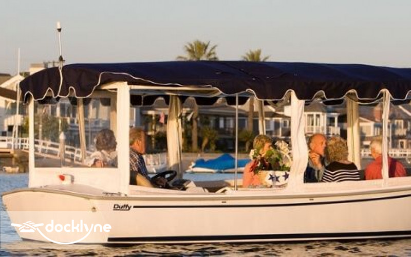 Rent a 21′ Duffy Electric Boat with Full Enclosure from Newport Harbor - Boat Rentals of America Docklyne